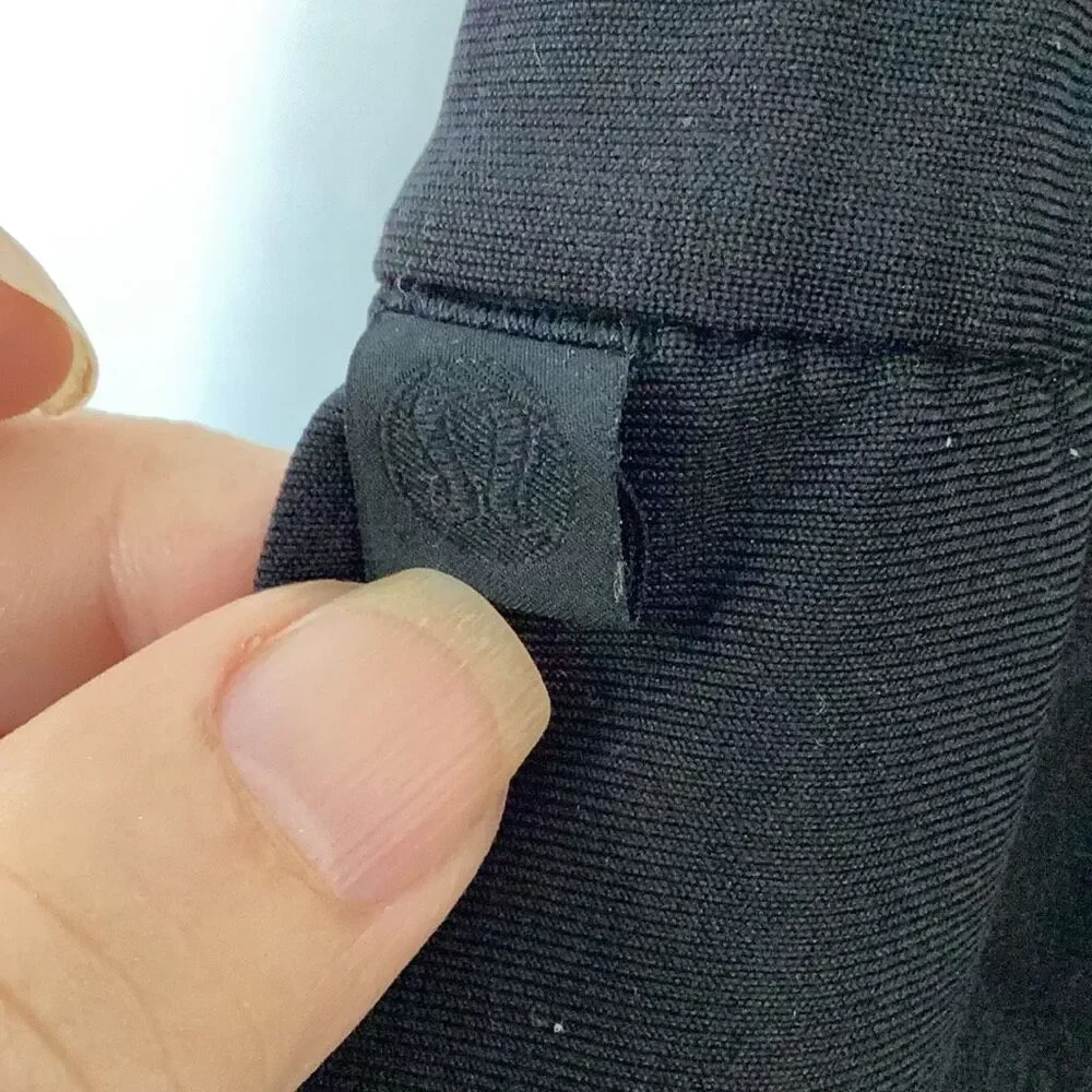 Lululemon Black Pull-On Stretch Travel Pants Women’s Large Tapered Ankle